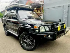 Toyota Land Cruiser Cygnus 2003 Hitam Met  No Genap Spek Overland