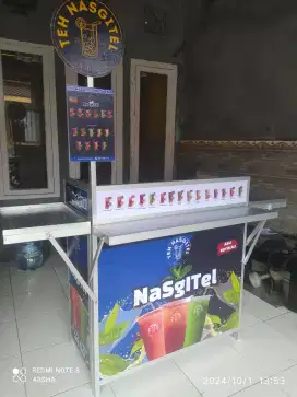 Pembuatan boothportable. Meja stand. Grobak dorong.etalase alumunium.