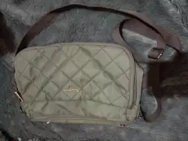 Tas slempang hijau