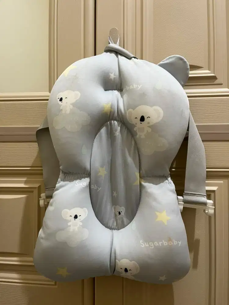Bantal bekas mandi bayi