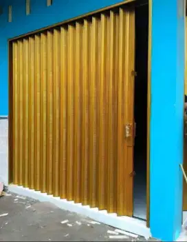 Tukang pintu besi folding gate dan rolling door