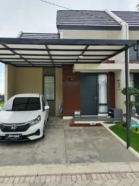 Rumah cluster cantik dekat simpang lima bandara