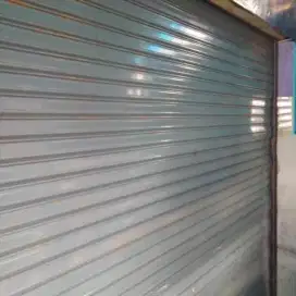 Tukang folding gate rolling door