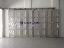 Spesialis pasang pintu garasi henderson terpercaya, bandung jaya steel