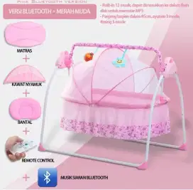 Tempat tidur bayi otomatis