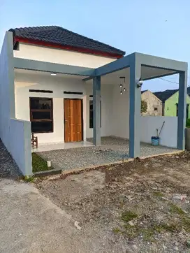 rumah cluster modern minimalis pinggir jalan raya