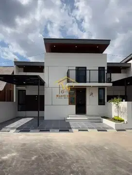 RUMAH MODERN KONTENPORER MEZZANINE DI GODEAN DALAM PERUMAHAN