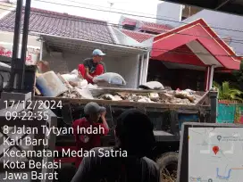 Buang puing sampah bangunan