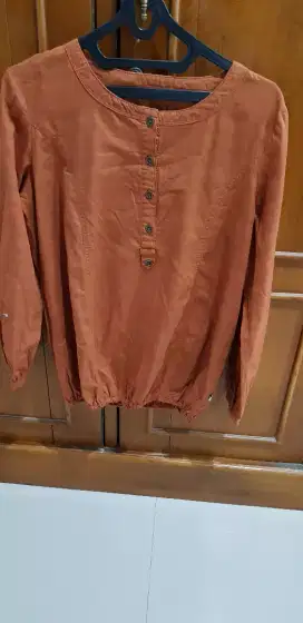 Blouse wanita Expand