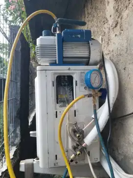 Layanan jasa bongkar pasang AC dan jasa servis AC netes,AC bocor