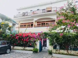 Elite boarding house of three-storey building for sale in Kuta Bali