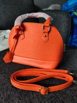 Tas orange Louise Vuitton