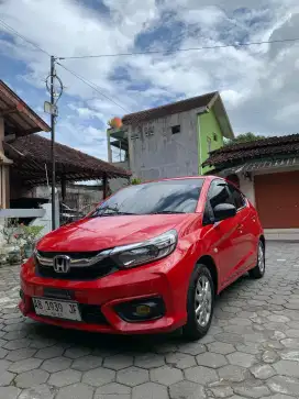 Brio E Satya Merah atas Nama Pribadi