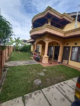 Rumah Dijual pinggir jalan Raya