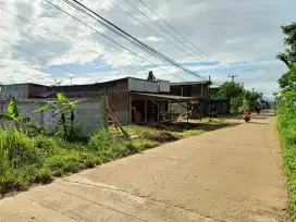 Tanah dan bangunan toko dan rumah