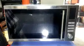 Microwave merk Tecnogas MWFS25HX kondisi mantul