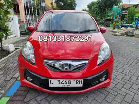 HONDA BRIO 1.2 E MANUAL THUN 2014 MERAH SURABAYA