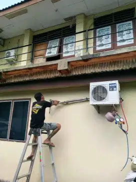 SERVICE AC BONGKAR PASANG AC