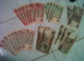 Uang lama campur mulus
