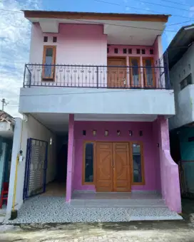 Dijual rumah beserta kamar kost ( bangunan baru)