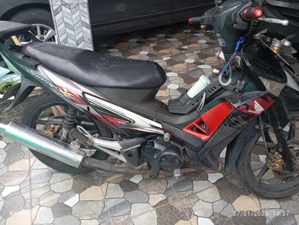Supra x 125 tahun 2010 tangan pertama