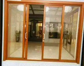 Partisi sekat ruangan rangka aluminium dan kaca polos