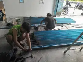 Tukang perbaikan folding gate dan rolling door murah