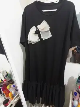 Dress hitam model Nagita bawah umpak umpak