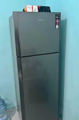 Menerima kulkas 2 pintu rusak