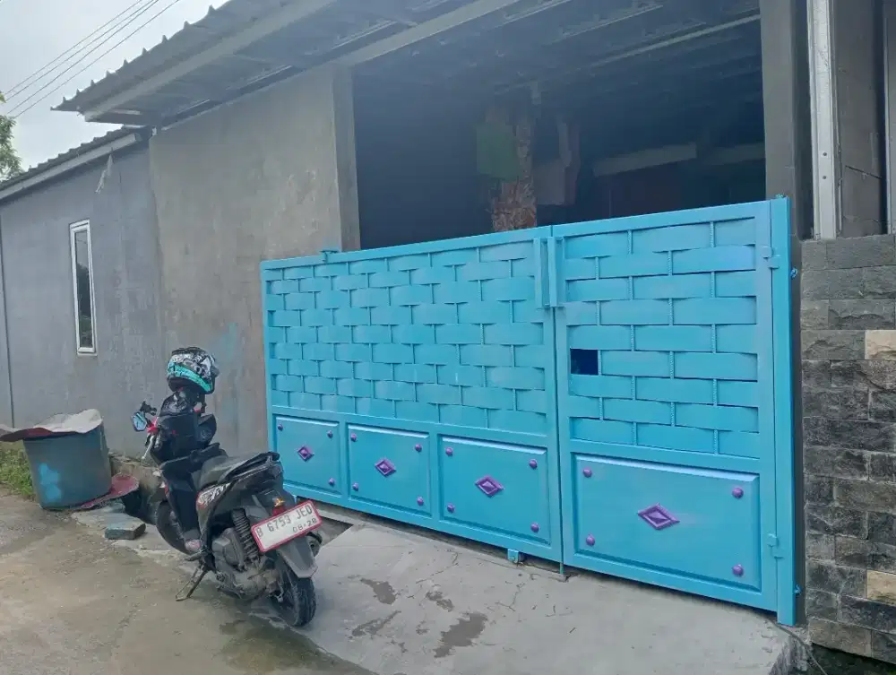 Gerbang rumah sulam moderen