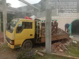 Urugan material puing murni dan buang sampah