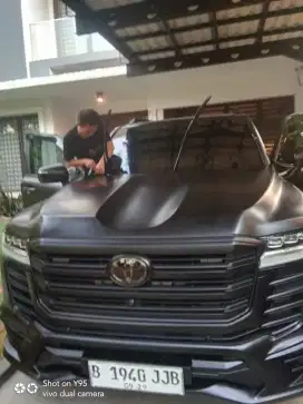 Spesialis kaca film mobil dan gedung panggilan