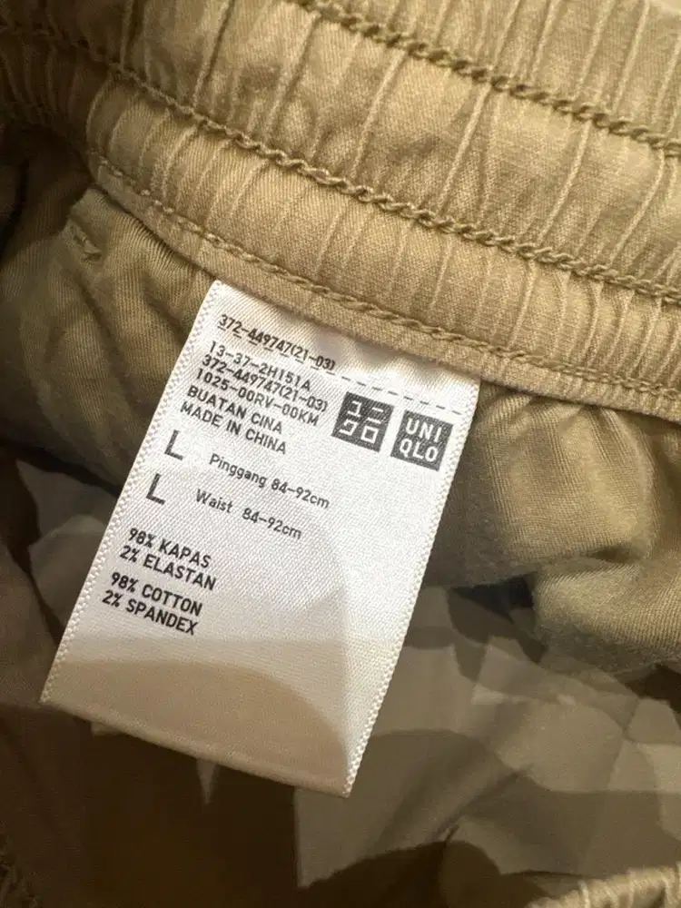 CELANA PRIA merk UNIQLO ORI SIZE L 84-92CM