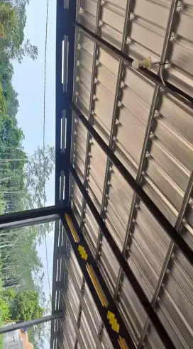 Kanopi rangka galfalum atap spandek dan plafon gypsum Sidoarjo