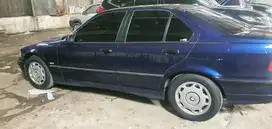 BMW 323i 1999 Bensin