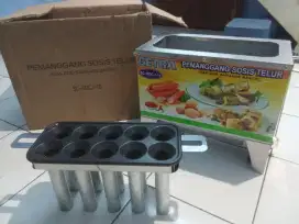 PEMANGGANG SOSiS TELOR