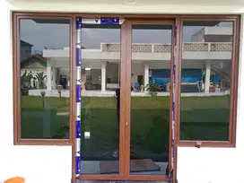 Kusen Pintu Aluminium Urat Kayu