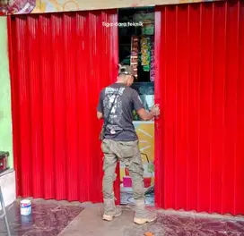 Folding gate pasang baru dan servis murah berkualitas Tiga Dara Teknik