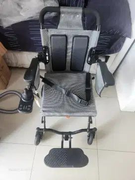 Kursi roda listrik 99%