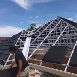 renovasi bongkar rangka atap lama di ganti rangka atap baja ringan