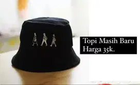 Topi hitam keren masih baru