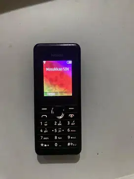 Nokia 106 charger + headset normal siap pakai