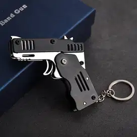Mainan Pistol Karet