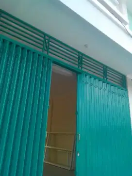 Folding gate rolling door