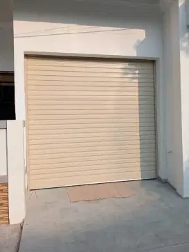 Folding gate rolling door