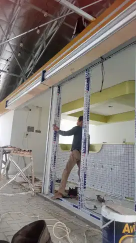 Folding gate rolling door