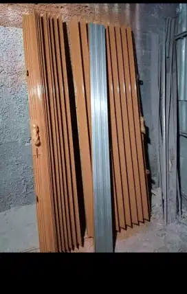 Folding gate rolling door