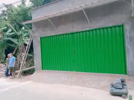 Folding gate rolling door
