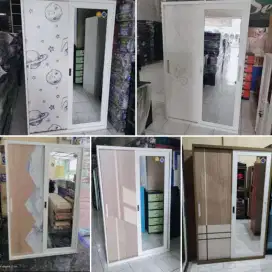 Lemari besi pintu geser 120x50x185 motif Madiun kota