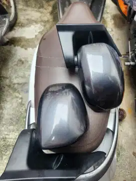 Spion original sigra bawaan mobil.